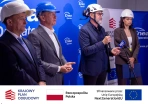 Prezes Enei Grzegorz Kinelski przemawia wśród pozostałych gości 